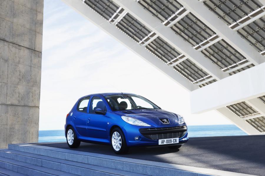  Peugeot 206 Plus 2009 года  (фото 48 из 49)